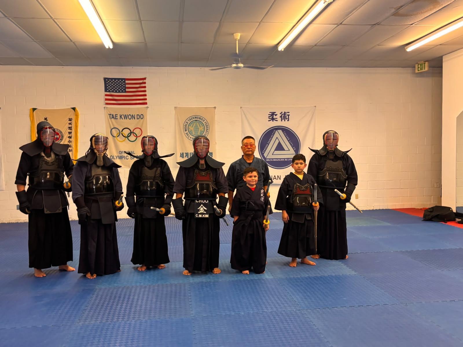 Kendo class lined up inside the dojo
