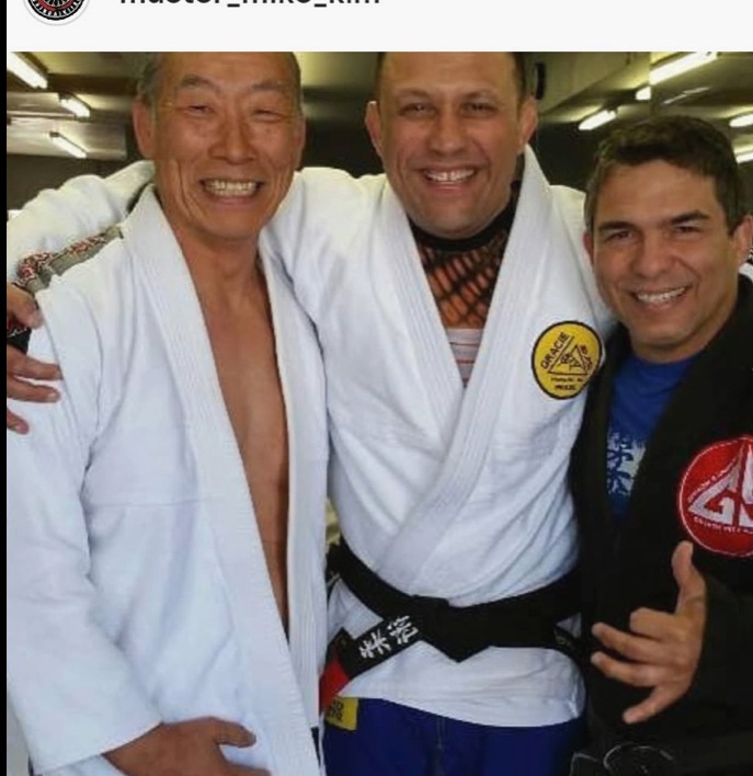 Three martial arts instructors together